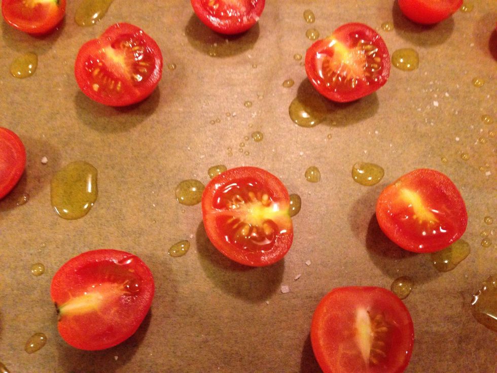 Drop olive oil on top of the tomatoes.