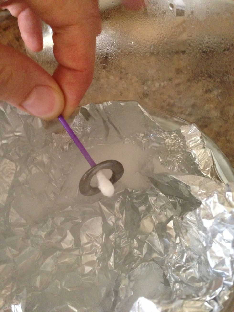 Drop silver in. Make sure it touches the aluminum.