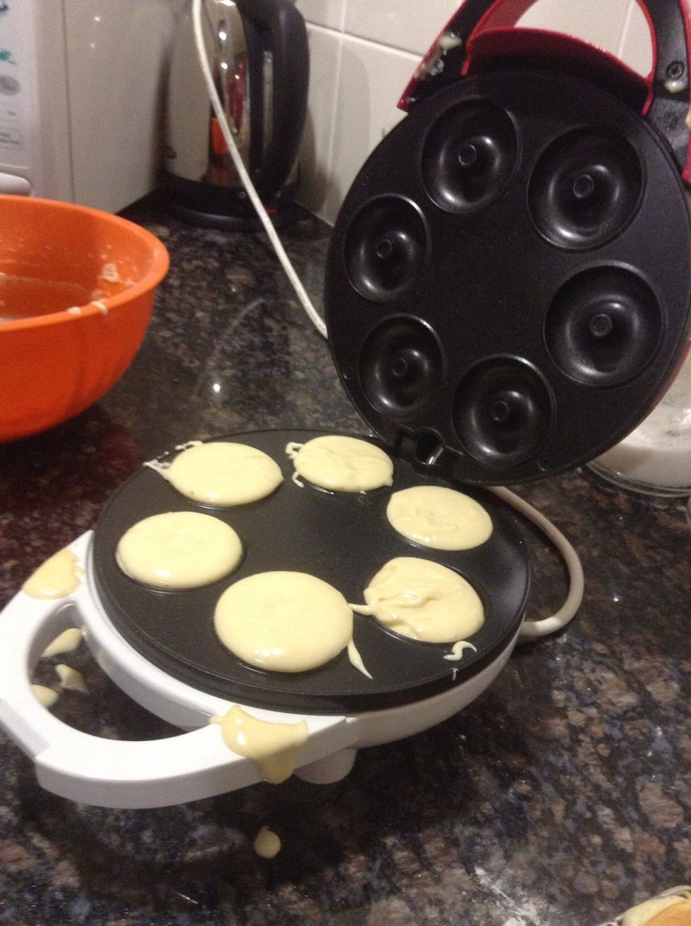 Drop small amounts of the mixture into the DOUGHNUT maker.