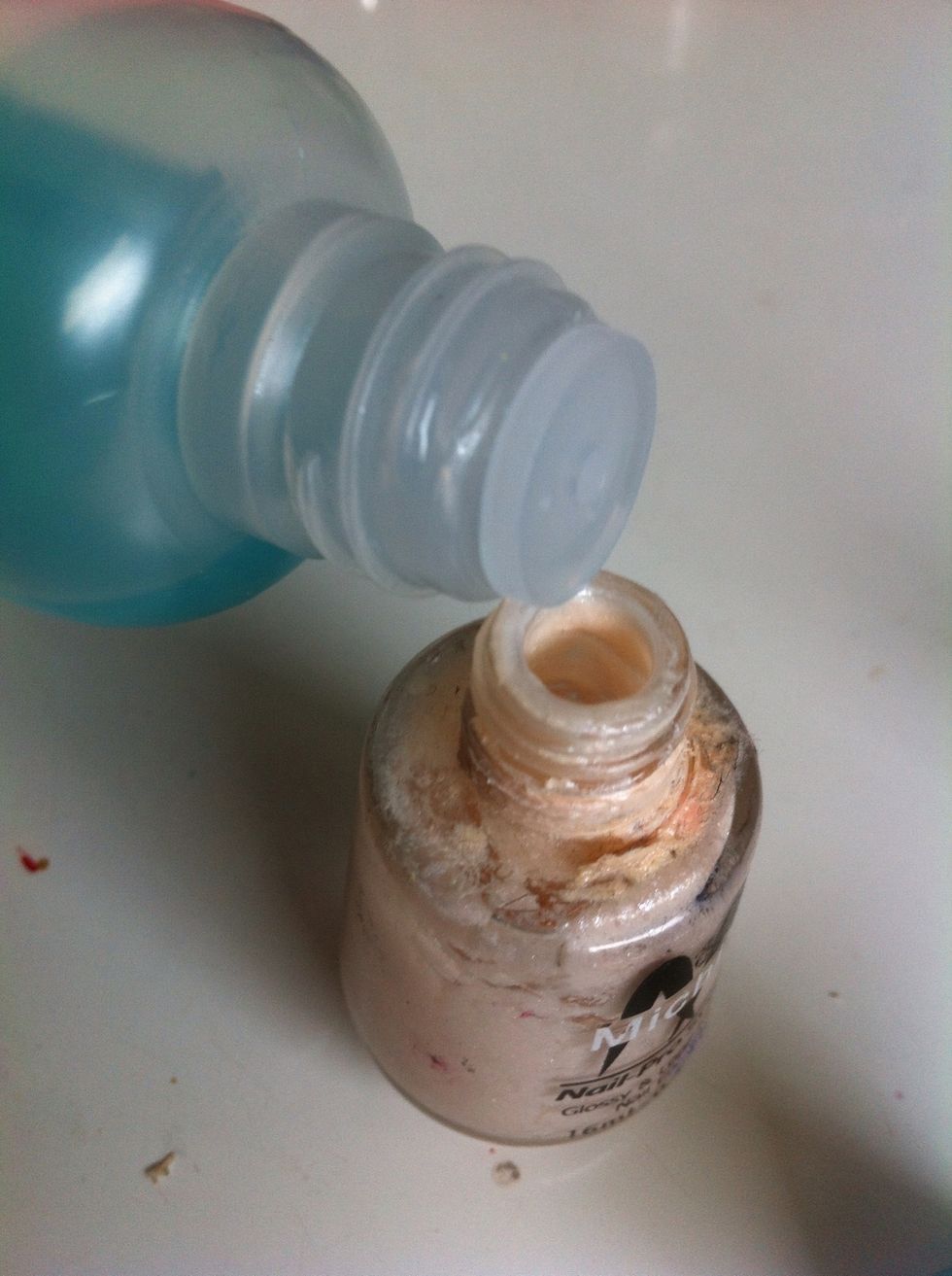 Drop some nail polish remover into your nail polish..maybe 3-5 drops ( if your nail polish is REALLY dry Then i recomend 5-10 drops of nail polish remover)\ud83d\ude04