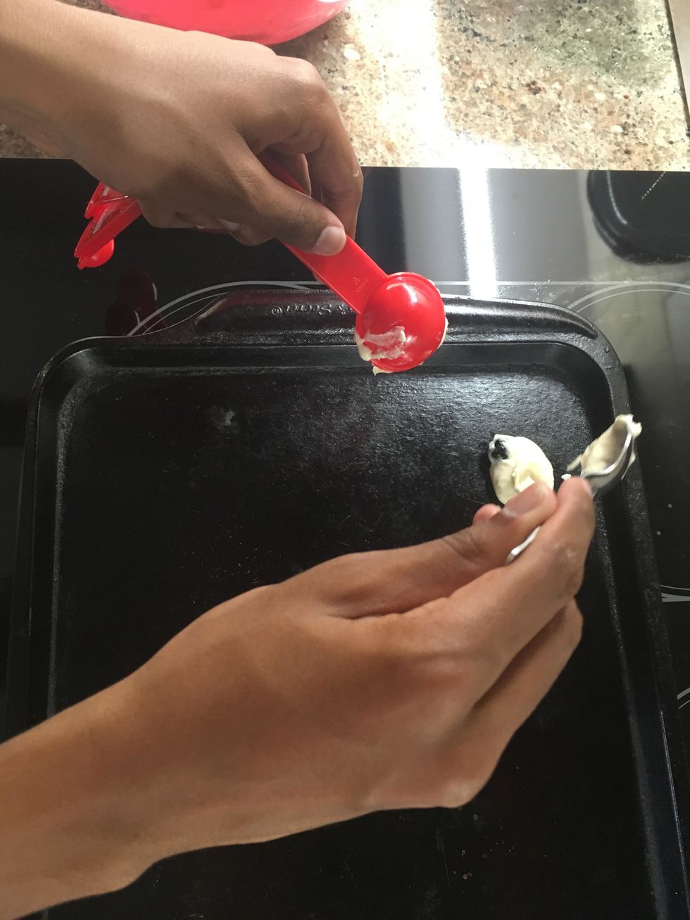 Drop Tablespoon Sizes Of Batter Onto Non-Stick Baking Pan/Sheet.