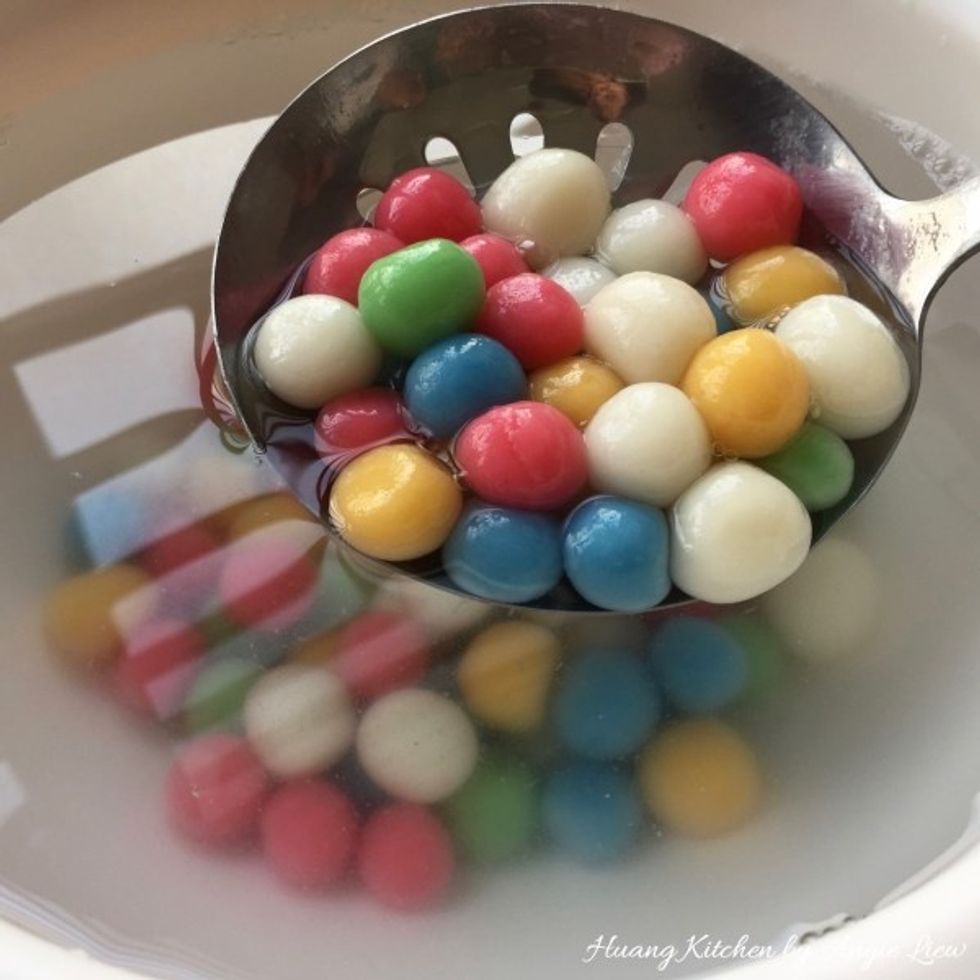 Drop the cooked rice balls immediately into a bowl of cool boiled water for about a minute.