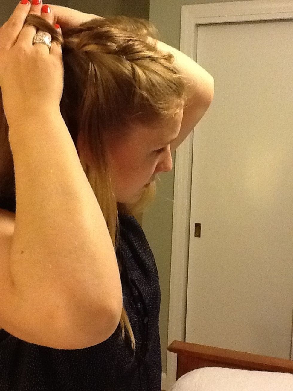 Drop the right section of hair.