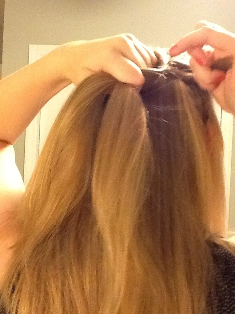 Drop the right section of hair.