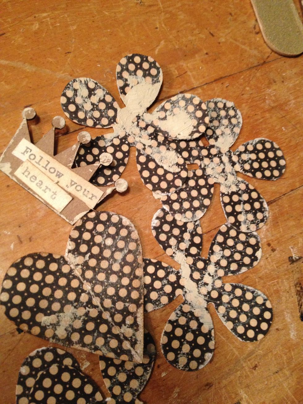 dry brush flowers (and embellishment pieces) with gesso or paint.