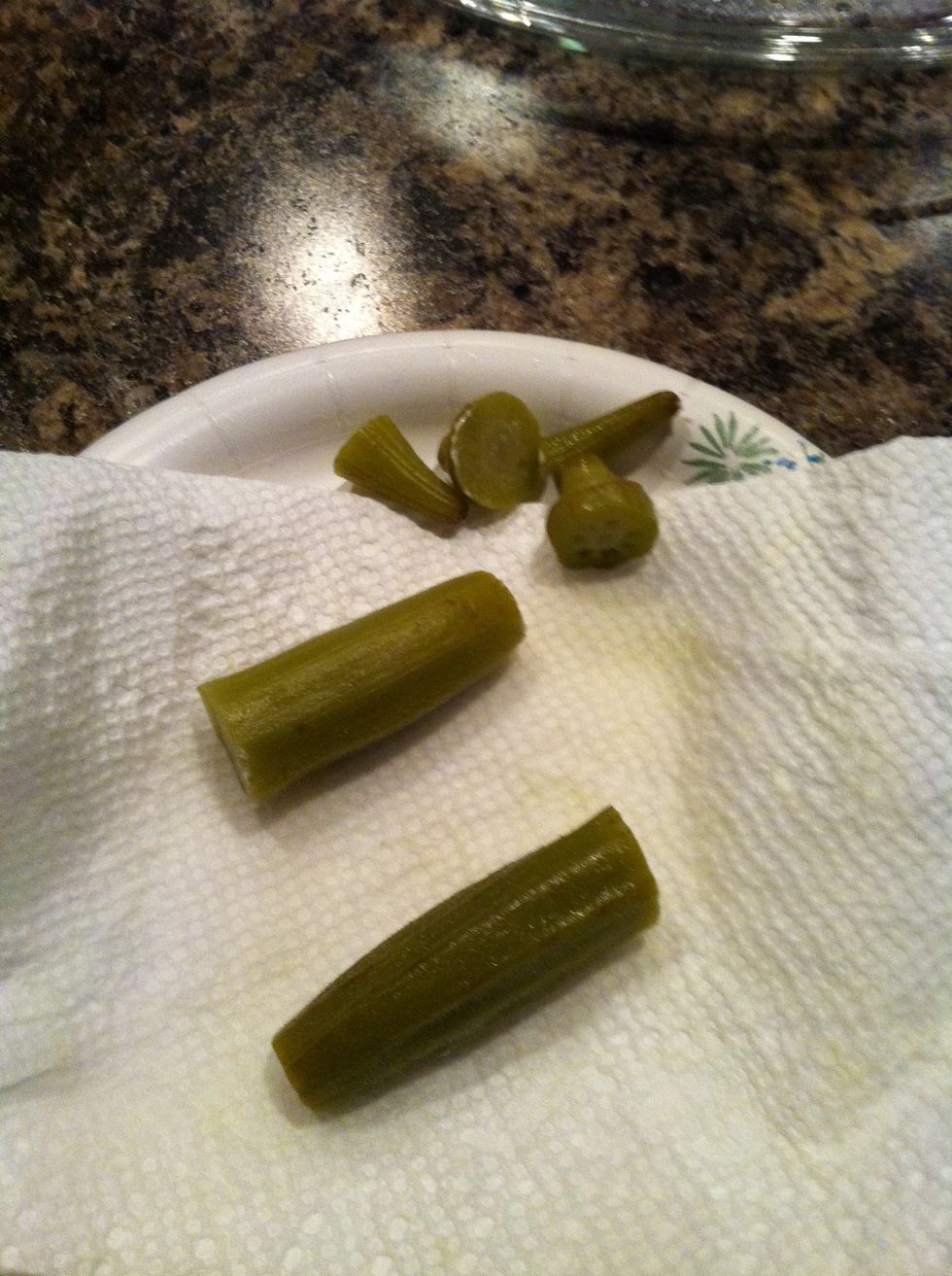 Dry excess juice off okra & cut tips off.