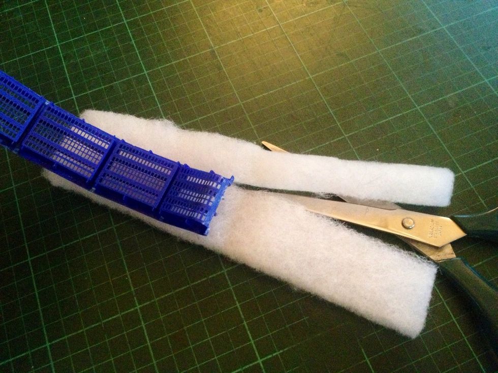 Dry out the activated carbon. While waiting, align the empty cartridge against a new nylon gauze and cut according to size. Be as accurate as you can. Waste not, want not.