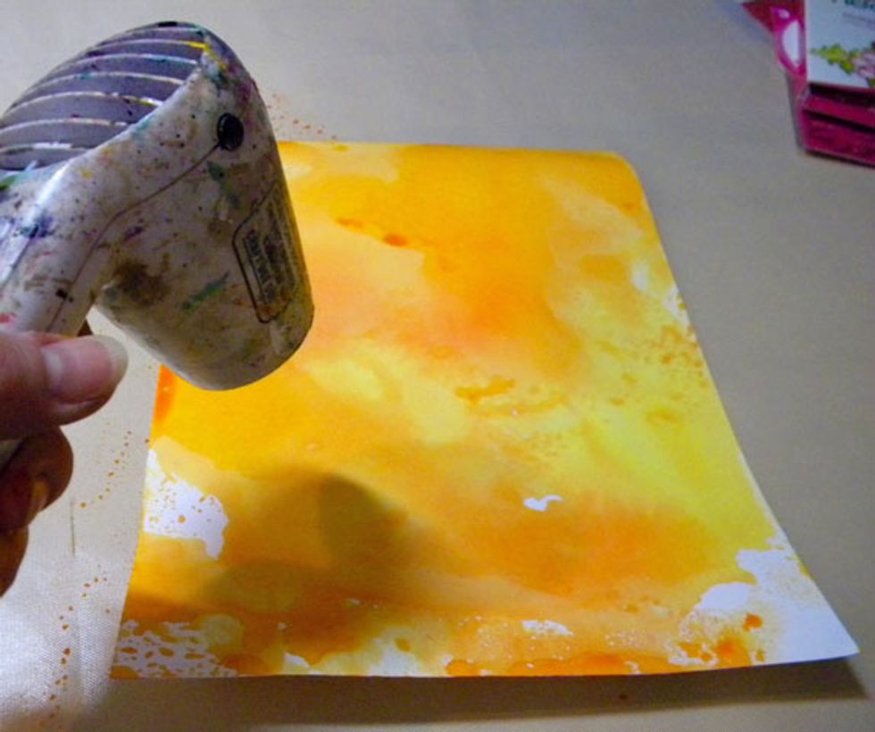 Dry the paper with a heat tool or let dry completely before die cutting.