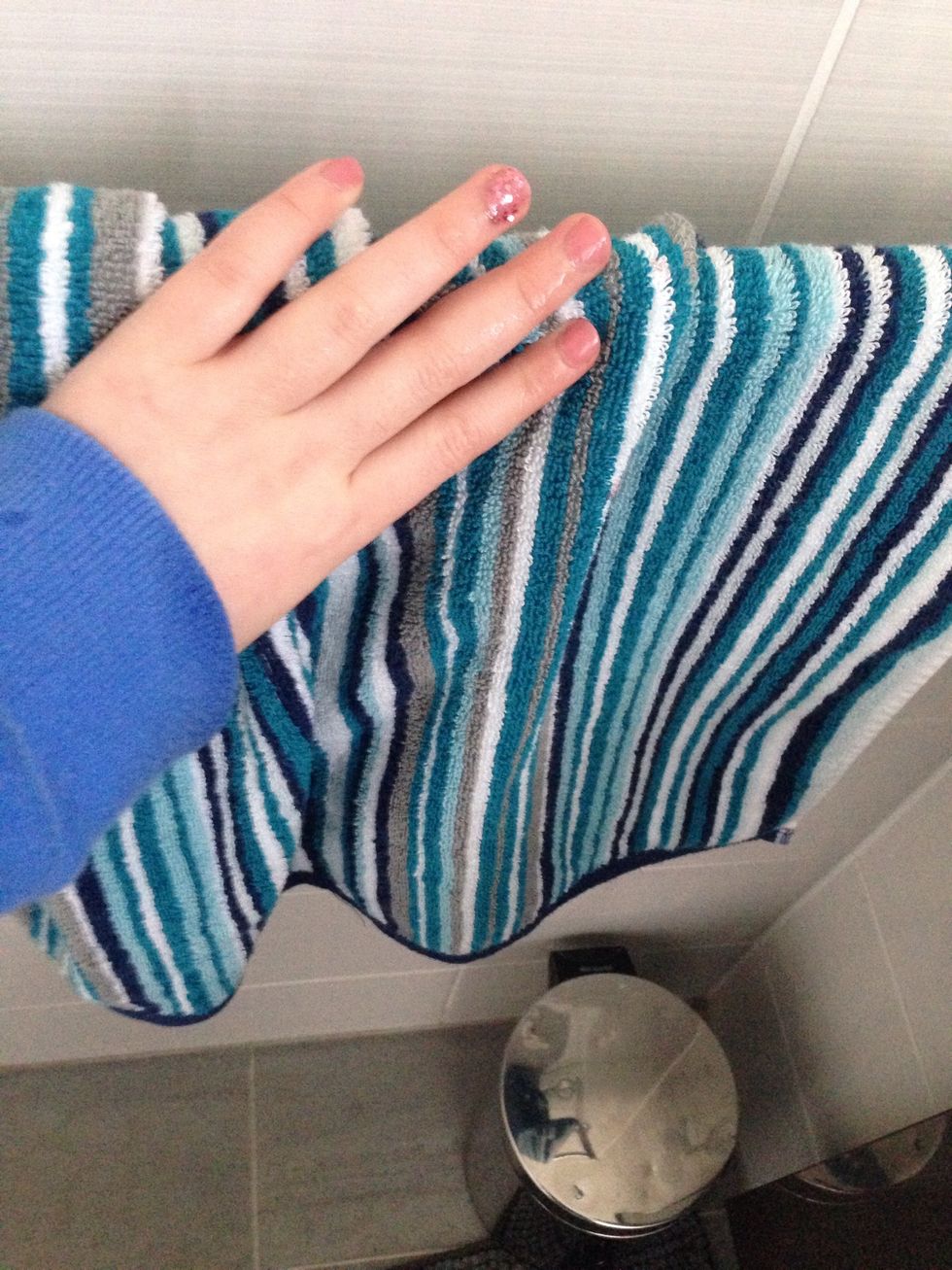 Dry your fingers but only dry the side without your nails to prevent smudges