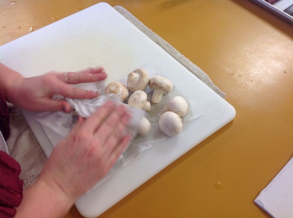 Drying the mushrooms.