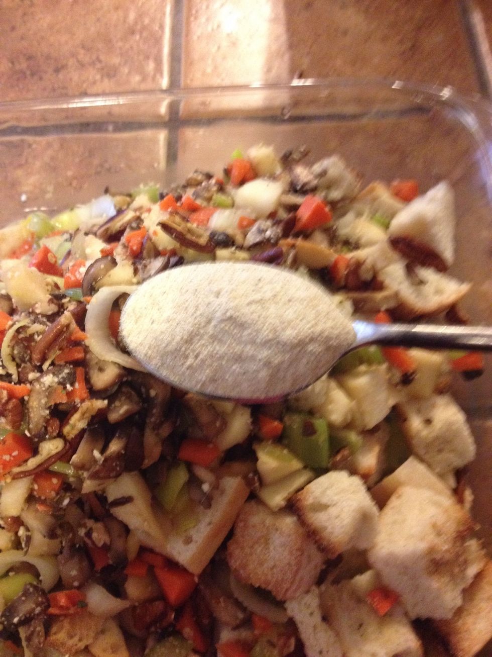 Dump contents of saut\u00e9 pan into casserole dish. Add apple chunks and bread crumbs. Add heaping tbsp of seasoning and mix together to coat all with egg.