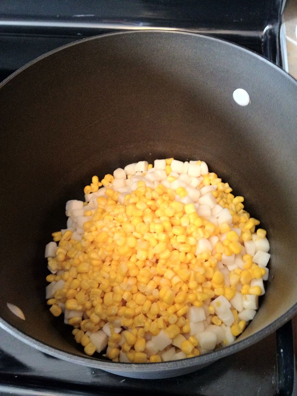 Dump corn and potatoes into large pot of awesomeness.