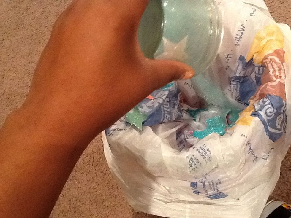 Dump excess glitter out then peel you sticker off and...