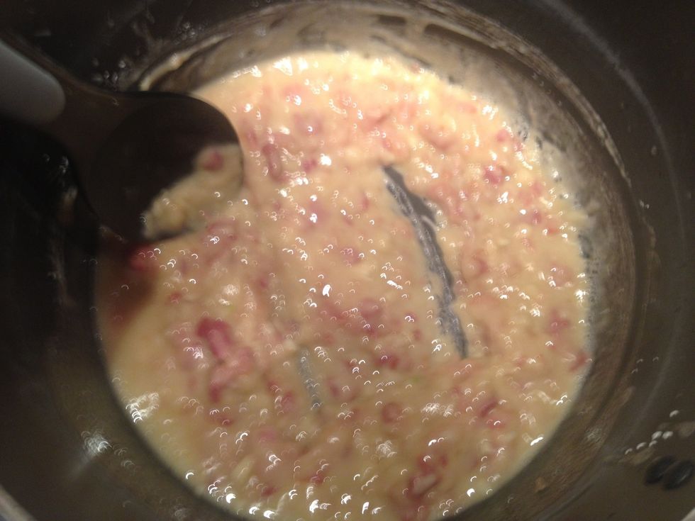 Dump in your flour and stir continuously for a minute or two. Don't brown it, but cook out the raw flour taste.