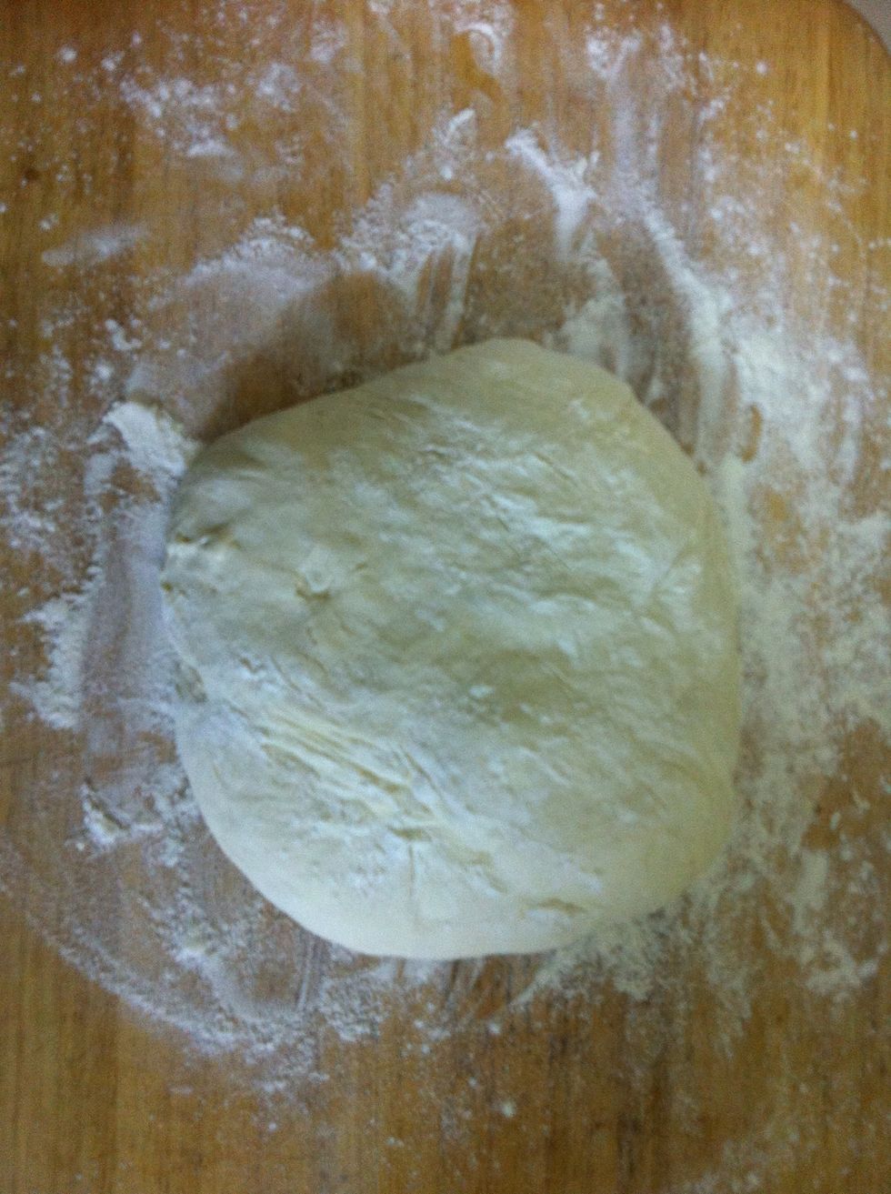 Dump it in the counter, punch it down to deflate it