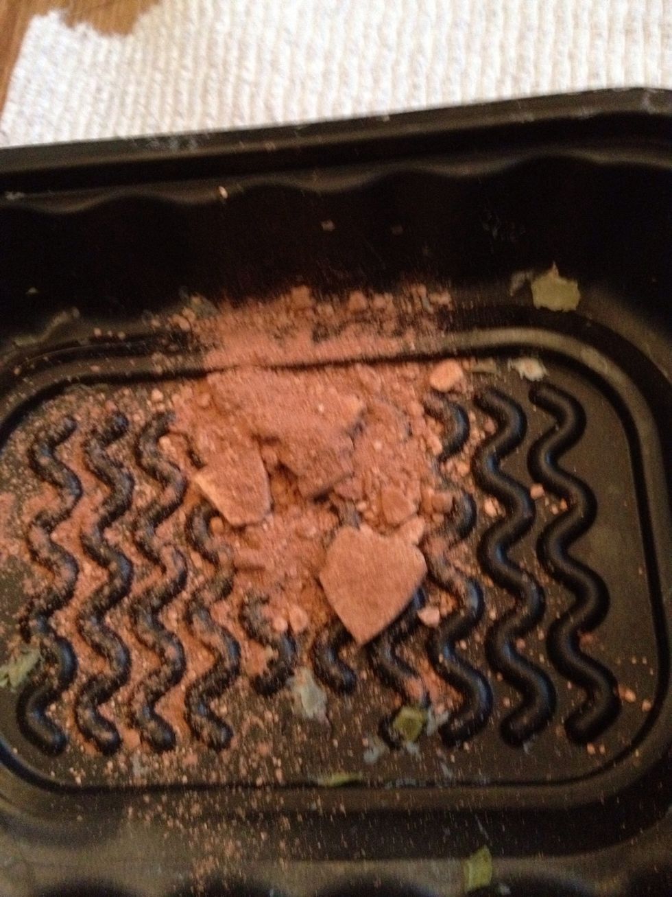 Dump it into your garbage bag or container.