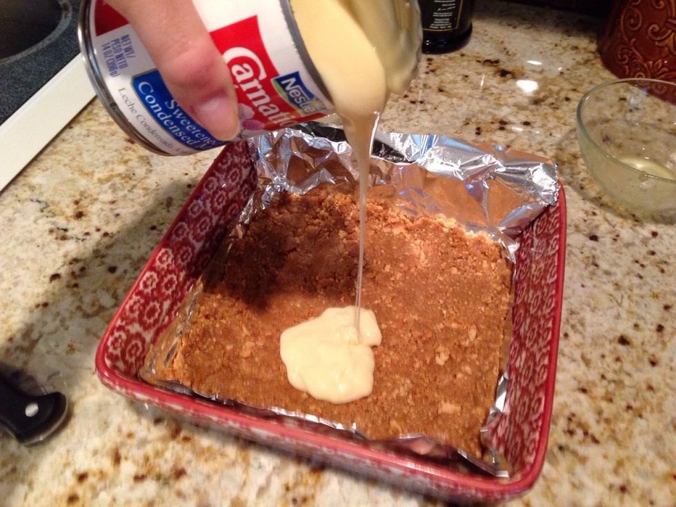 Dump on the 14 oz. condensed milk, or spread marshmallow fluff.