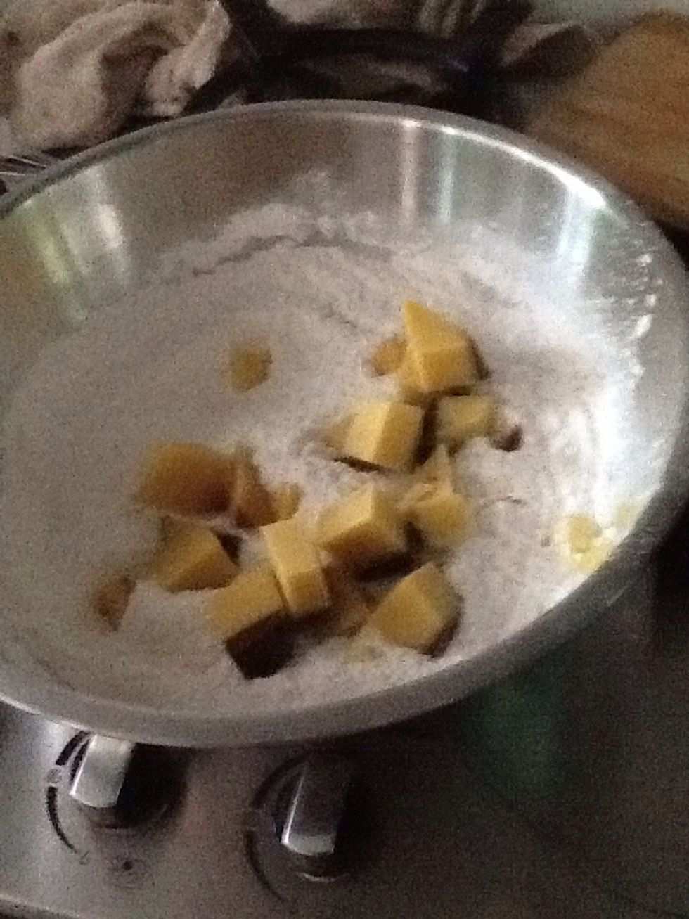 Dump onto flour mixture and knead in with ur hands or cutters.