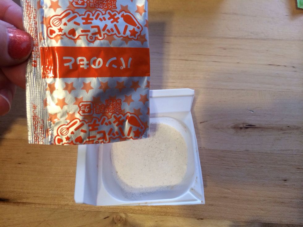 Dump ORANGE Bread Powder Packet into Mixing Tray
