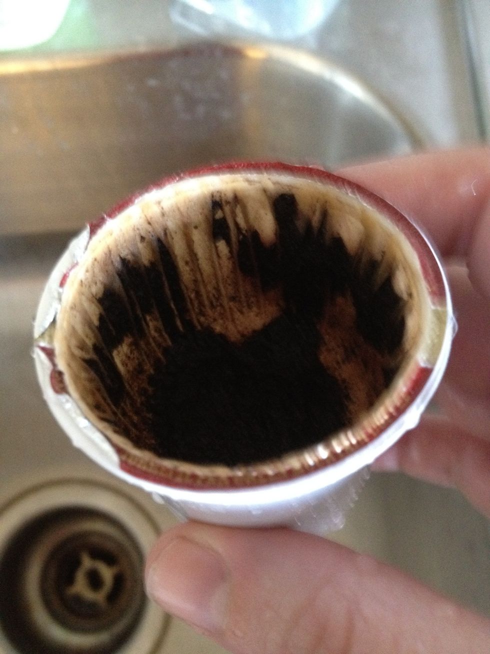 Dump out coffee grinds. (save aside if you want to use them in your garden)