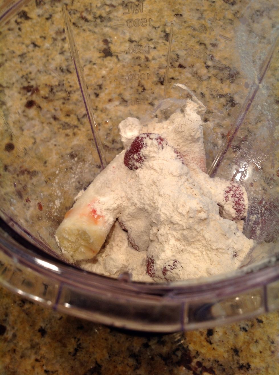 Dump soy powder in the blender on top of the fruit. TIME = 10 seconds