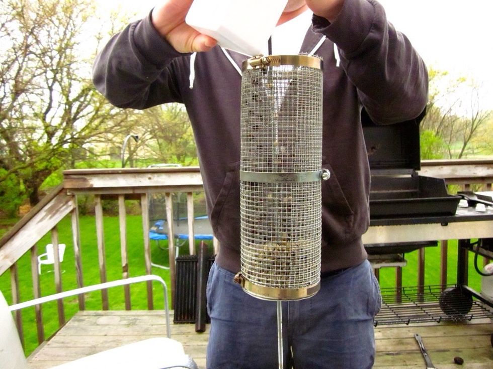 Dump the beans into your roaster. Here we've built a roaster from parts at Home Depot. Quite easy and inexpensive to do.