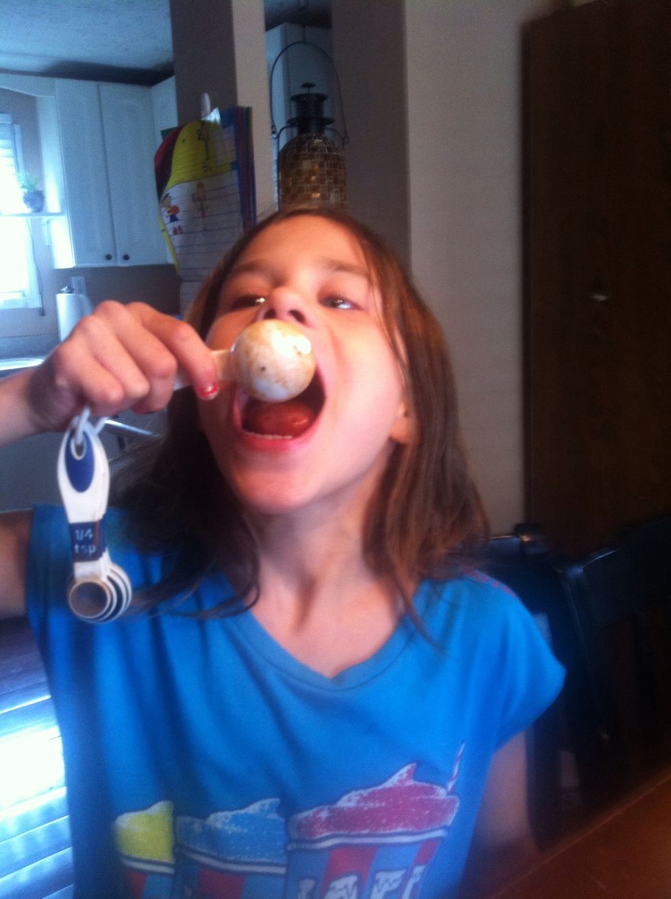 Dump the cinnamon into your mouth. The challenge part is swallowing all of the cinnamon.