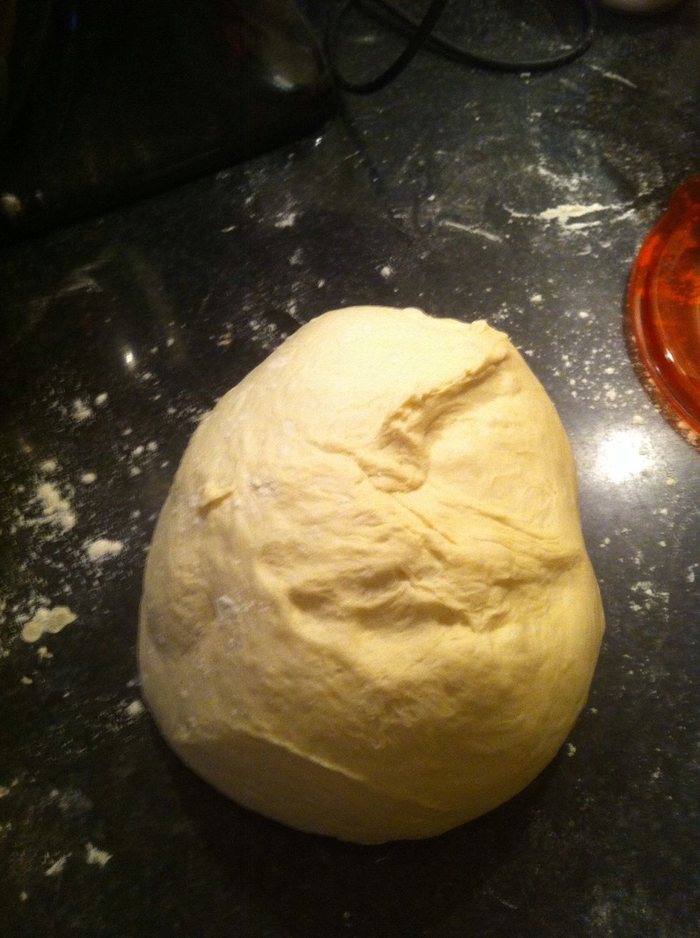 Dump your dough out onto a floured work surface and cut it into 4 equal portions by weight. For this dough each portion was about 282 grams.