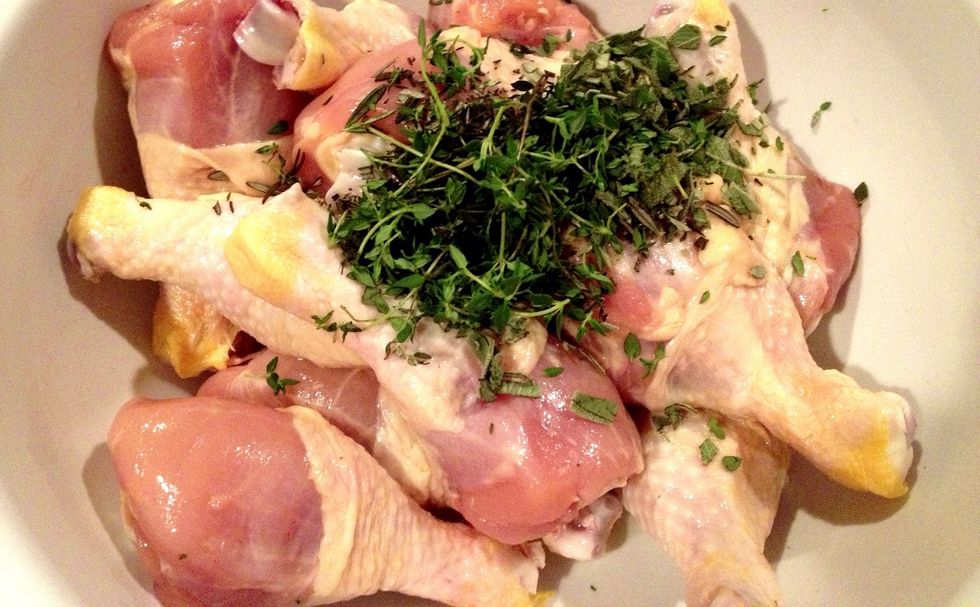 Dump your herbs in,  reserving a couple tablespoons to the side.  Add appx 3 tbsp of olive oil.