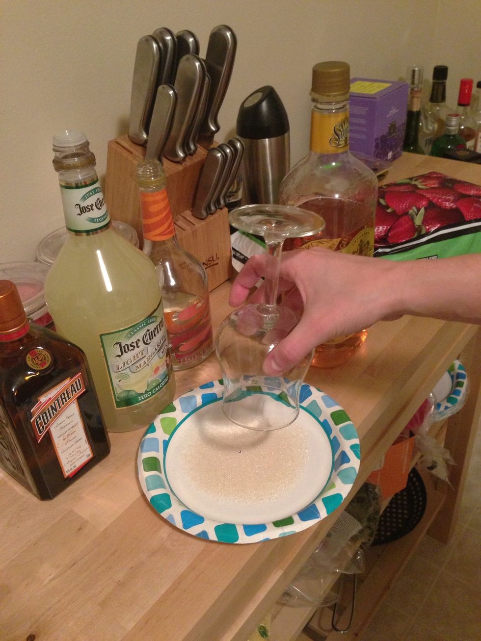 Dunk in a plate of sugar or salt.