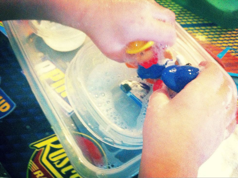 Dunk in soap, wash with water...