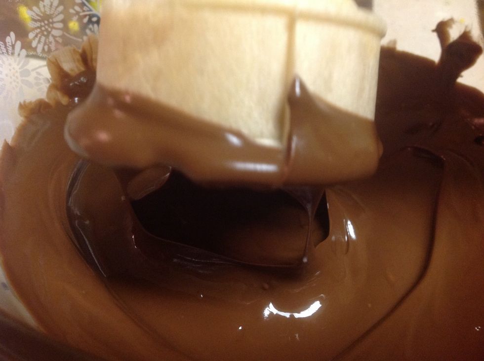 Dunk in your cone in the chocolate. Just on the rim of the cone.