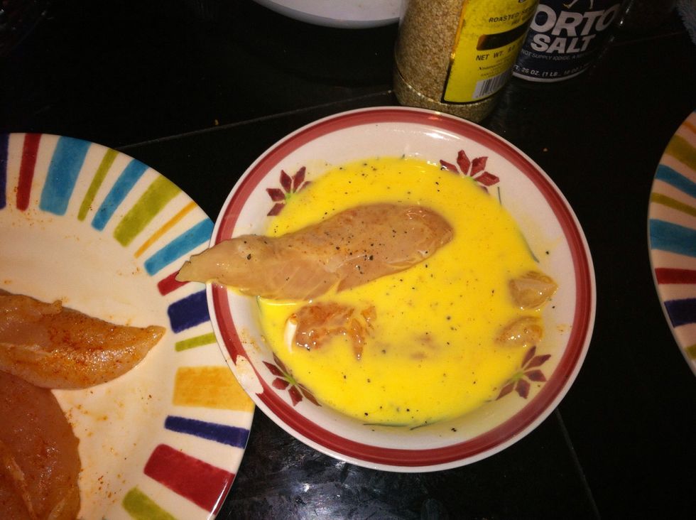Dunk your chicken into the egg batter , let it completely submerge  the chicken