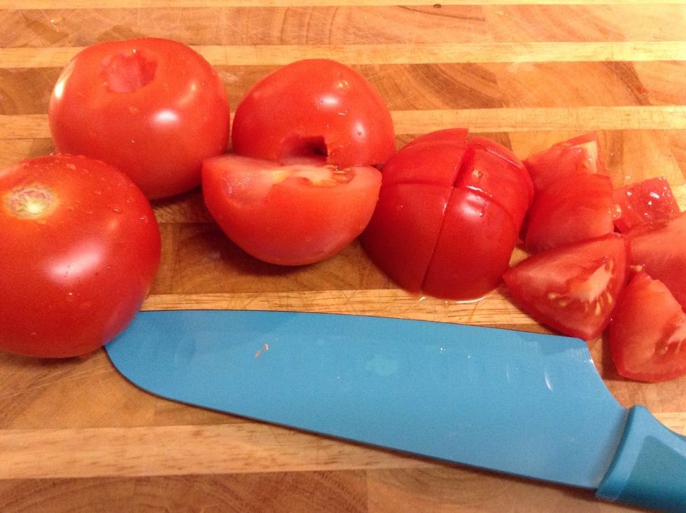 During that time dice the tomatoes...