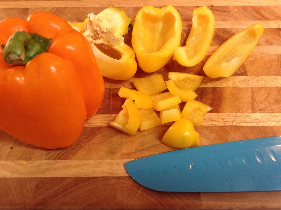 During that time remove the seeds from the yellow and orange peppers and dice them...