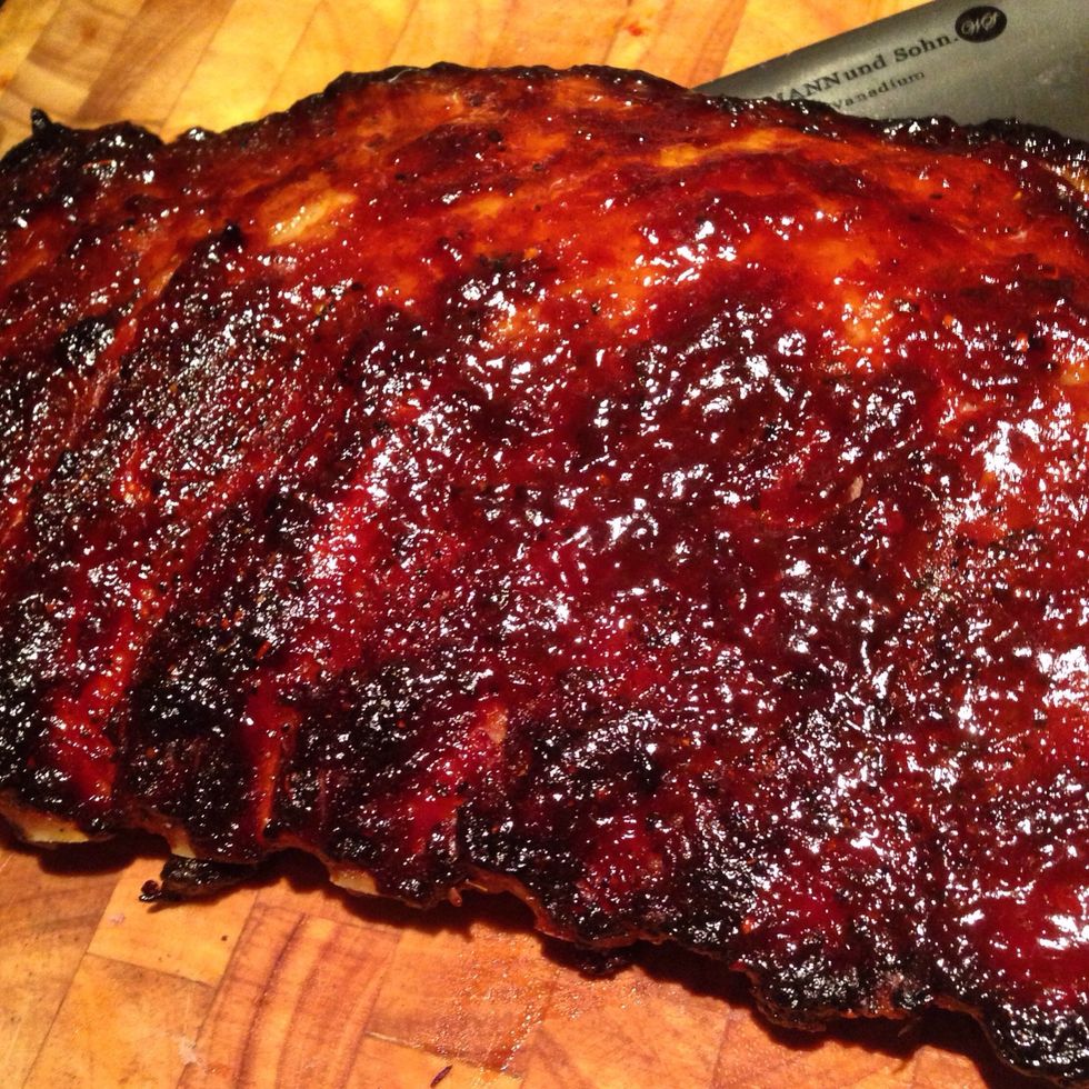 During the last 30mins, the sugar in the sauce will start to caramelise and that dark BBQ'd colour will start to come through. When you're happy with the colour take it out. Let is rest for 5-10 mins.