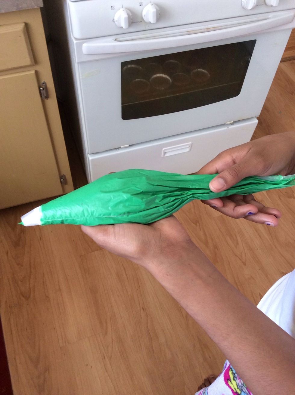 During those 15 minutes put the frosting in the frosting bag