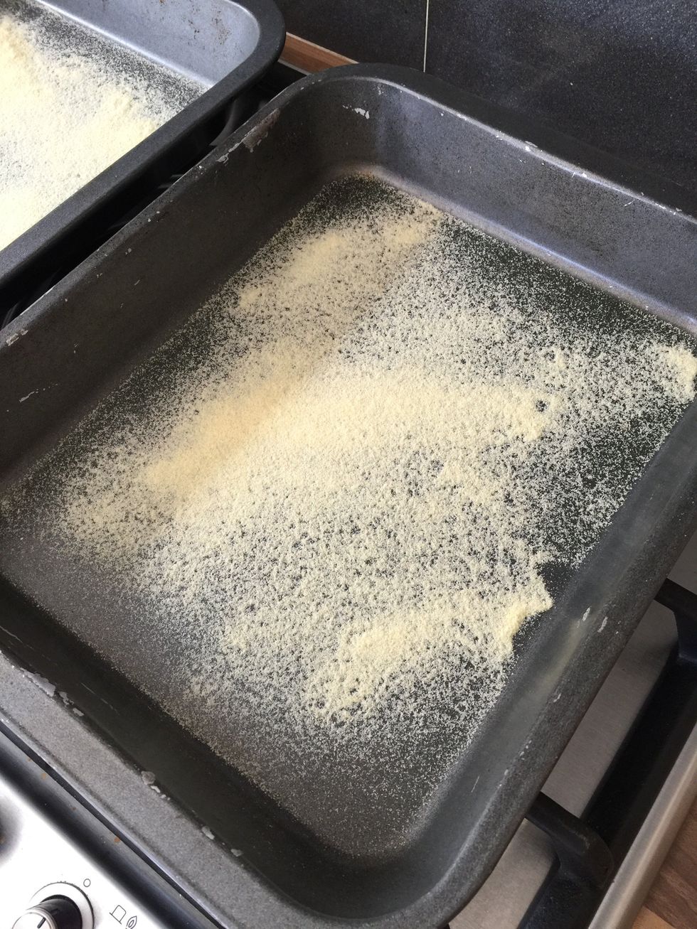 Dust a couple of baking trays with semolina. This will stop the bread sticking and give it a nice finish. You might be able to use flour here but I find semolina works well.