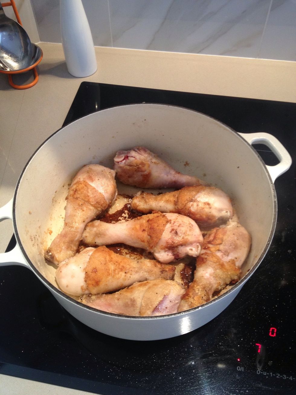 Dust drumsticks in plain flour, sprinkle salt and pepper, then add to a pan with olive oil on high heat. Sear the chicken until a nice brown crust forms. Around 10 mins.