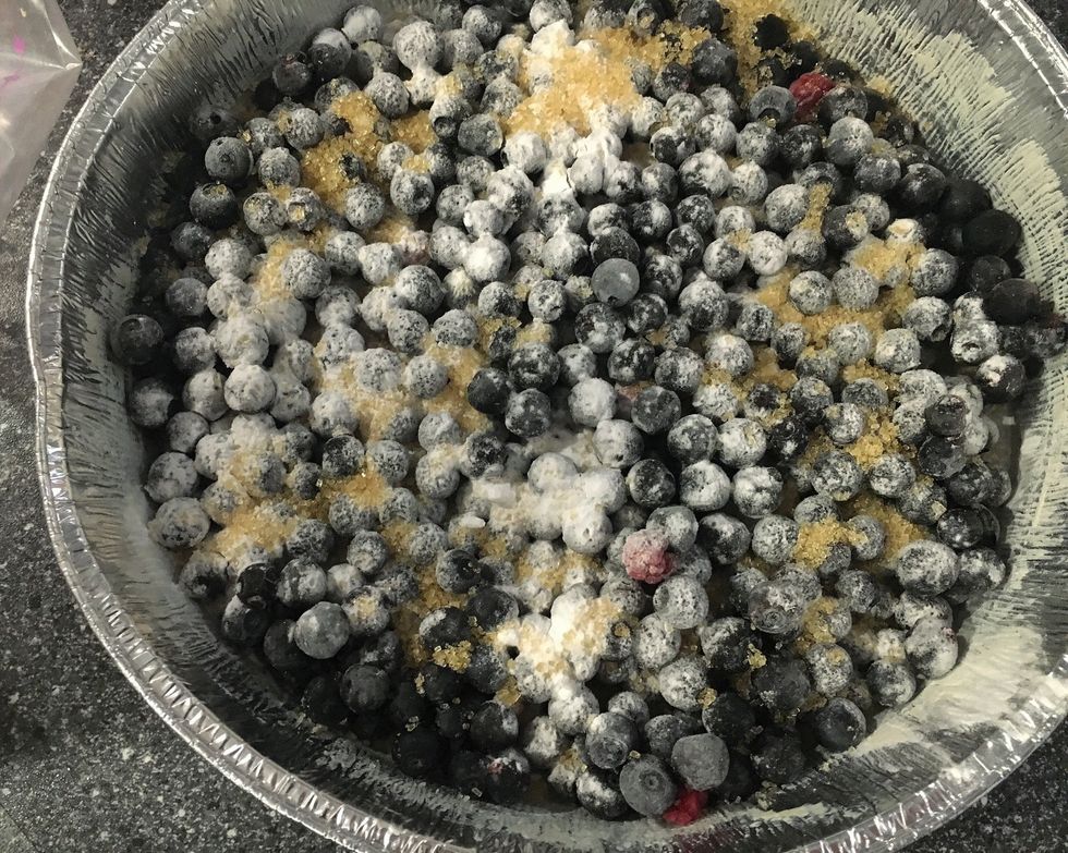 Dust the berries with corn starch and sugar.