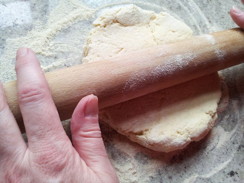 Dust the rolling pin with flour and roll until 2cm thick