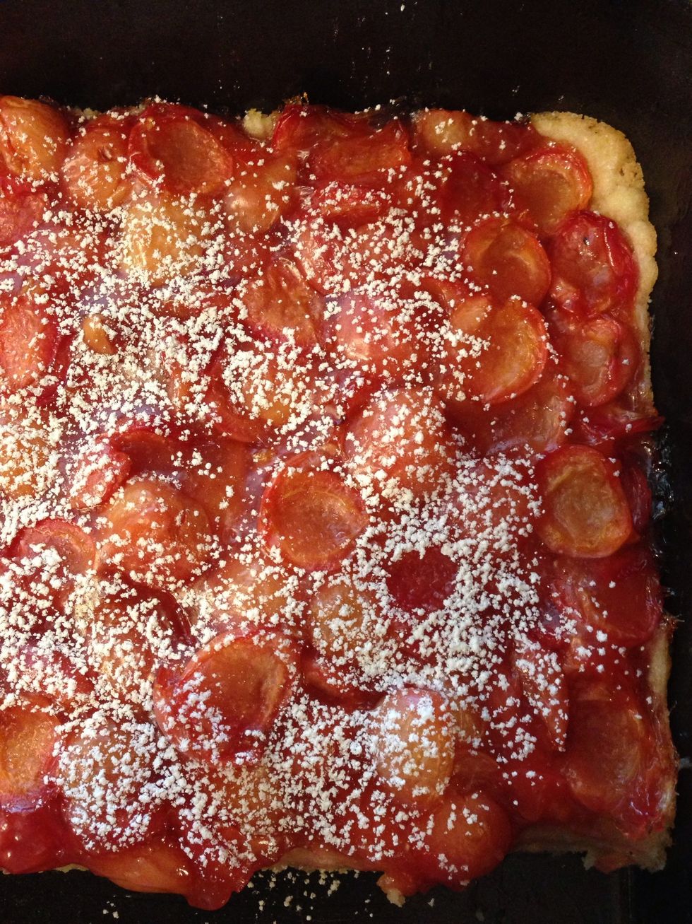 Dust with powdered sugar and sprinkle with coconut (if desired).