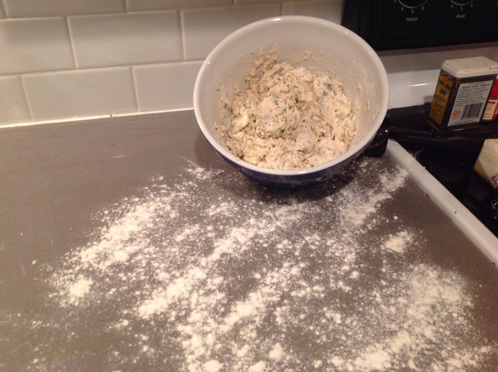 dust your counter with "bench flour". this will stop it from sticking to the counter. put some on your hands too to make handling the dough a bit easier.