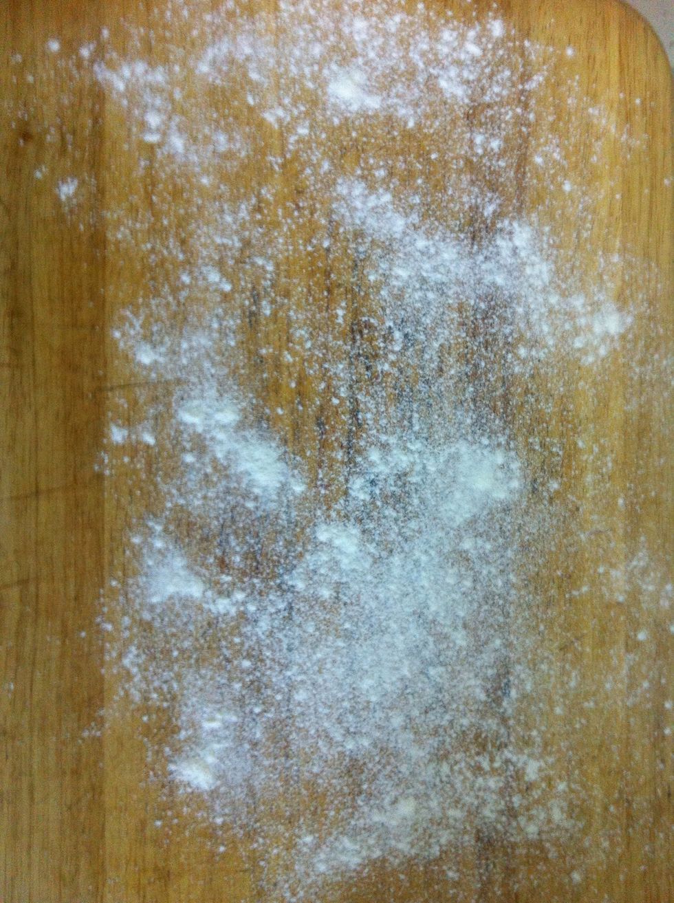 Dust your counter with flour and also dust your hands too, it's a very sticky dough after it ferments!