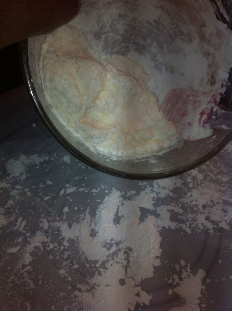 Dust your hands with confectioner's sugar. Once firm, place fondant on mat. Don't forget to power the mat with confectioner's sugar. I forgot! :)