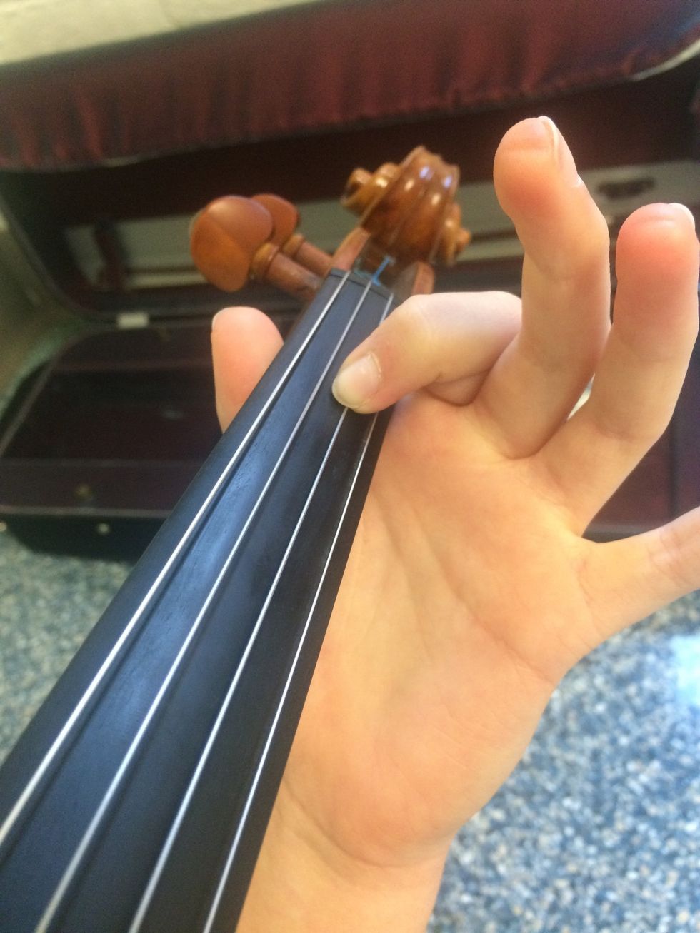 E or first finger twice.