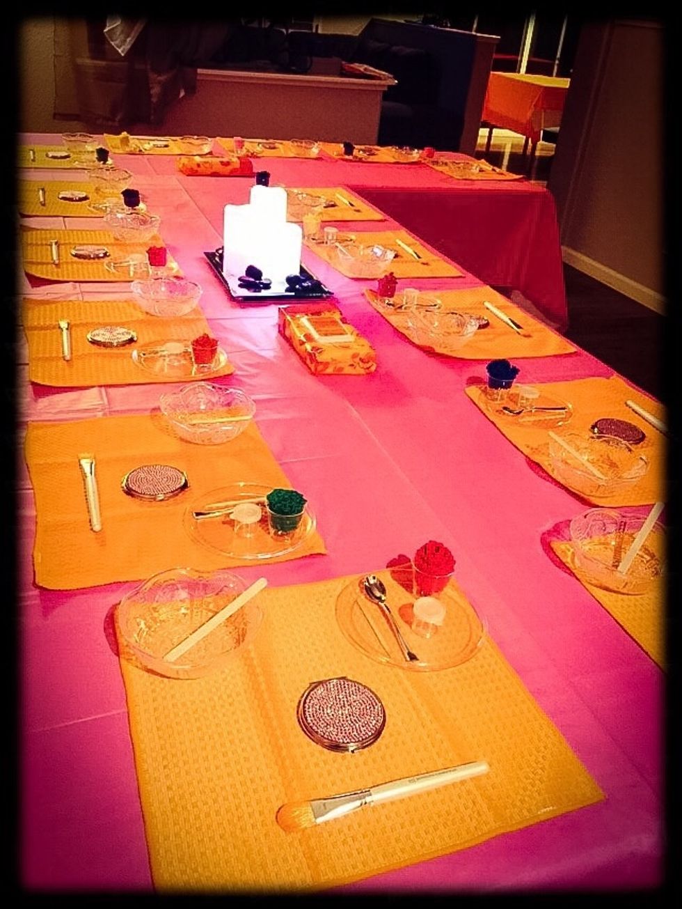 Each girl has a placement (car wash rags from Target. Use them after the party to clean). A bawl for face mask, little cup with hair band, little mirror and makeup brush - all from dollar store.