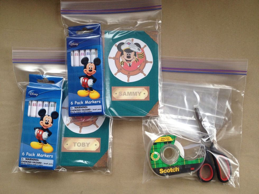 Each kid gets a ziplock Baggie with their book, stickers, and markers. I get a bag with scissors, tape, glue, and tiny bags to help them when needed to cut apart stickers & attach found items.