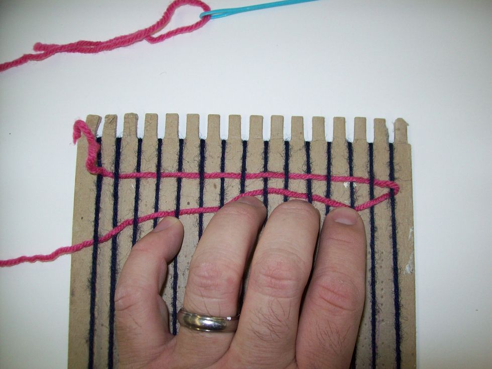 Each time you pass the weft through the warp you will need to BAT the weft. This means push that layer of weft up to align with the previous layer.