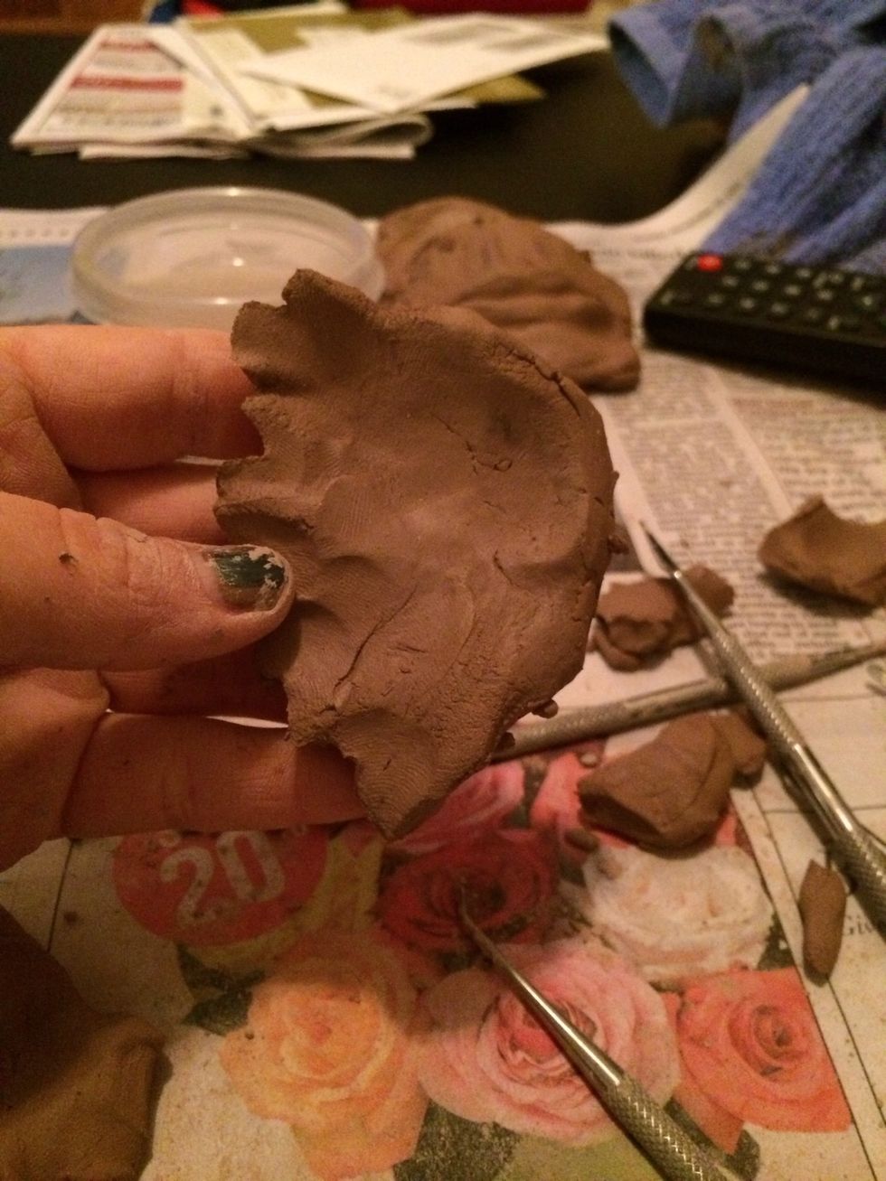 Ear. Start with a slab of clay.